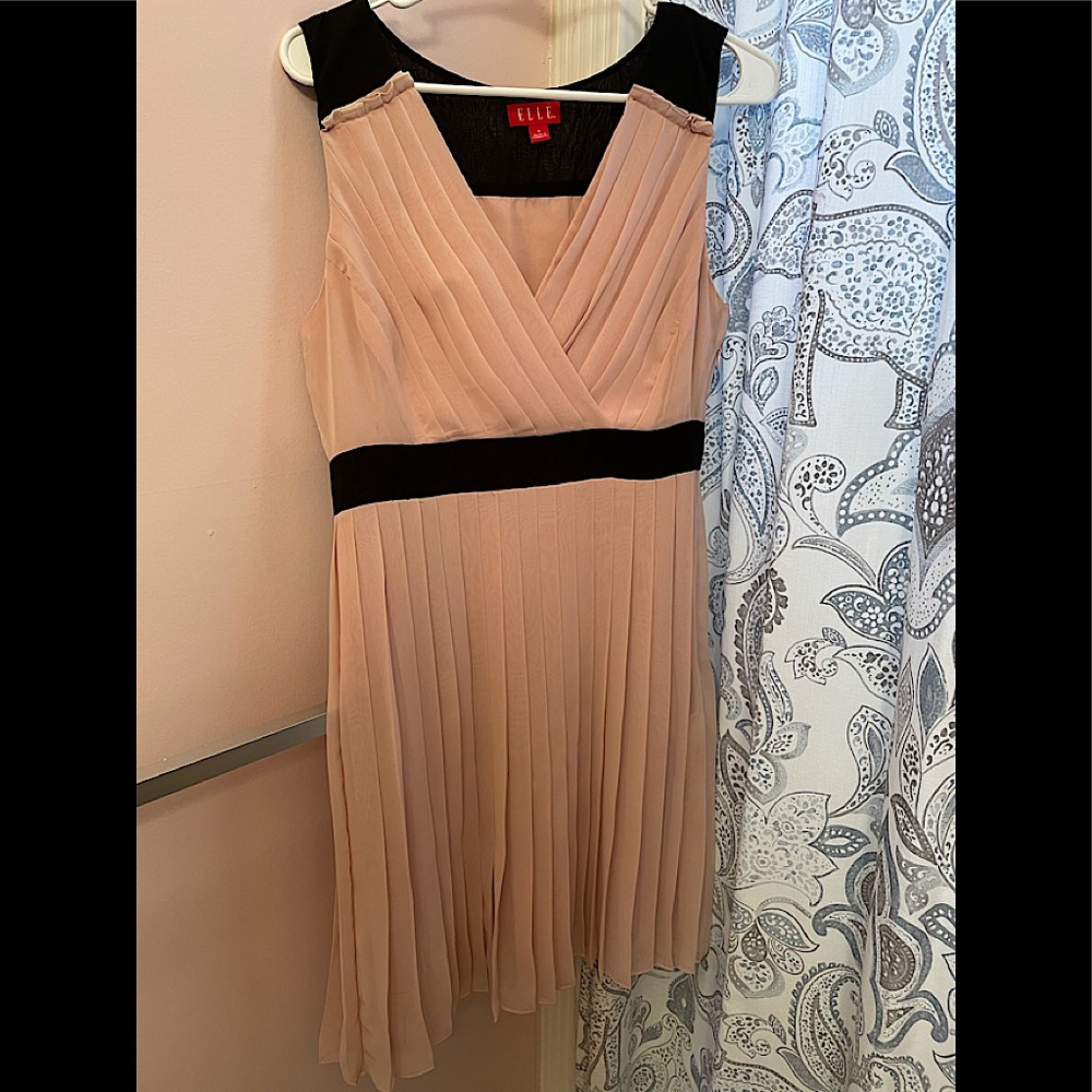 Blush pink pleated dress.